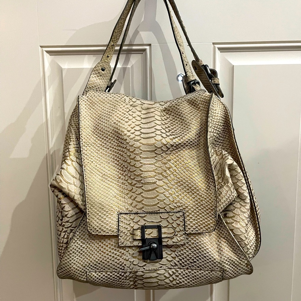 Like new Kooba bag. Dust bag and sealed authenticity info/cards included